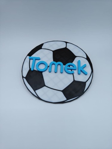 tomek pilka.jpg