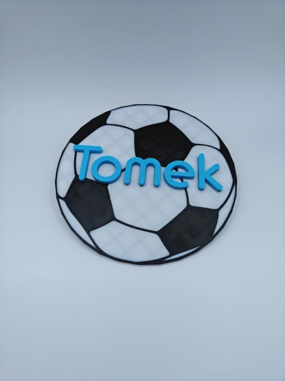 tomek pilka.jpg